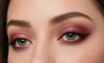 red eye makeup burgundy shadow placement close-up